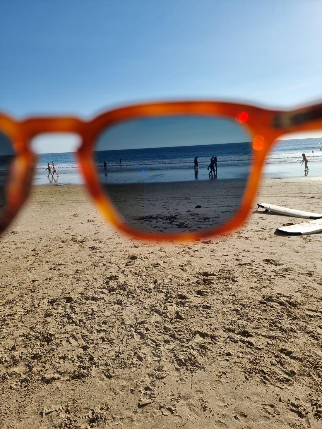 Looking through a sunlens at a beach